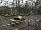 Rusting bumper cars that were part of an amusement