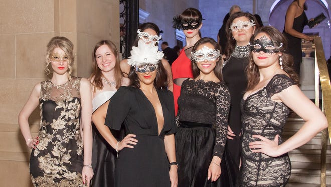 Attendees at the Cirque masquerade ball at the Detroit Institute of Arts in 2016.