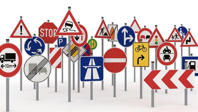 Too many traffic signs on white background - different version with selective focus please click the image blow: