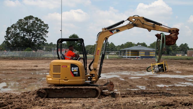 Construction continues at Wossman High School’s football field on Tuesday.