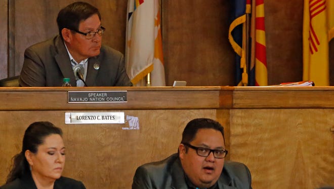 Michelle Dotson, left, executive director of compliance for the Navajo Nation Gaming Enterprise, and Navajo Nation Council Delegate Seth Damon address the Tribal Council on Wednesday in Window Rock, Ariz.