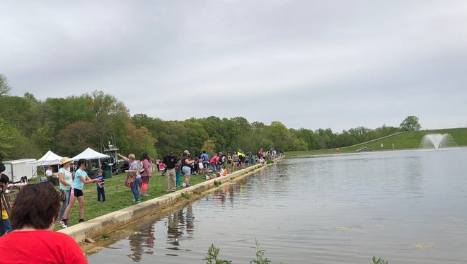 Officers teach kids how to fish at the third annual "Casting with Cops" with New Castle County police and New Castle County government Saturday at Glasgow Park.