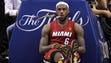 LeBron James #6 of the Miami Heat sits on the court