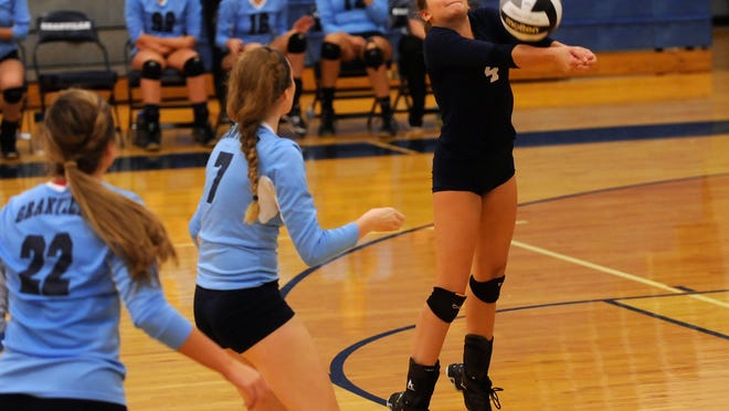 
Granville libero Morgan Dawson bumps the ball against Buckeye Valley in a Division II first-round match Tuesday.
