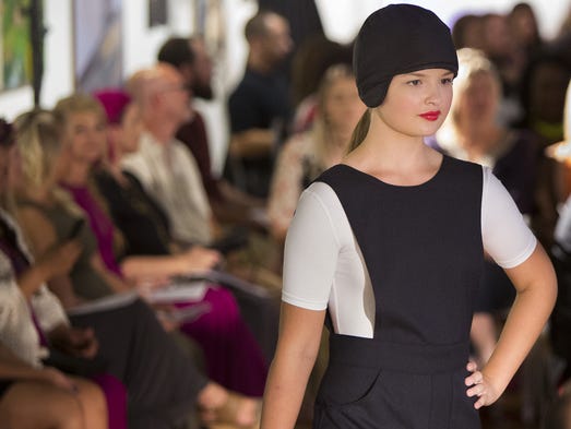 Tess Murphy, right, models an outfit for Arthur and