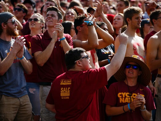 ISU fans cheer during the first half of their football