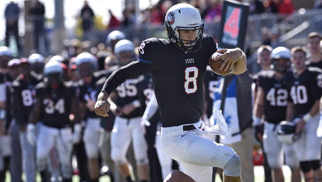 St. Cloud State's Nate Meyer runs with the ball during Saturday's game between St. Cloud State and Minnesota-Crookston at Husky Stadium in St. Cloud.