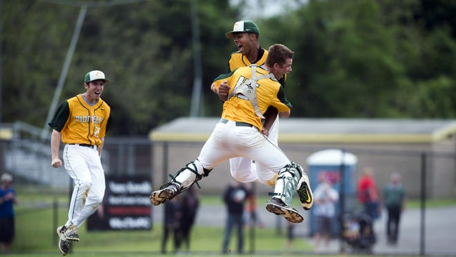 Clearview pitcher Kenny Mendoza and catcher Steve Schanne jump into each other's arms after the Pioneers defeated Millville for the South Jersey Group 4 title.