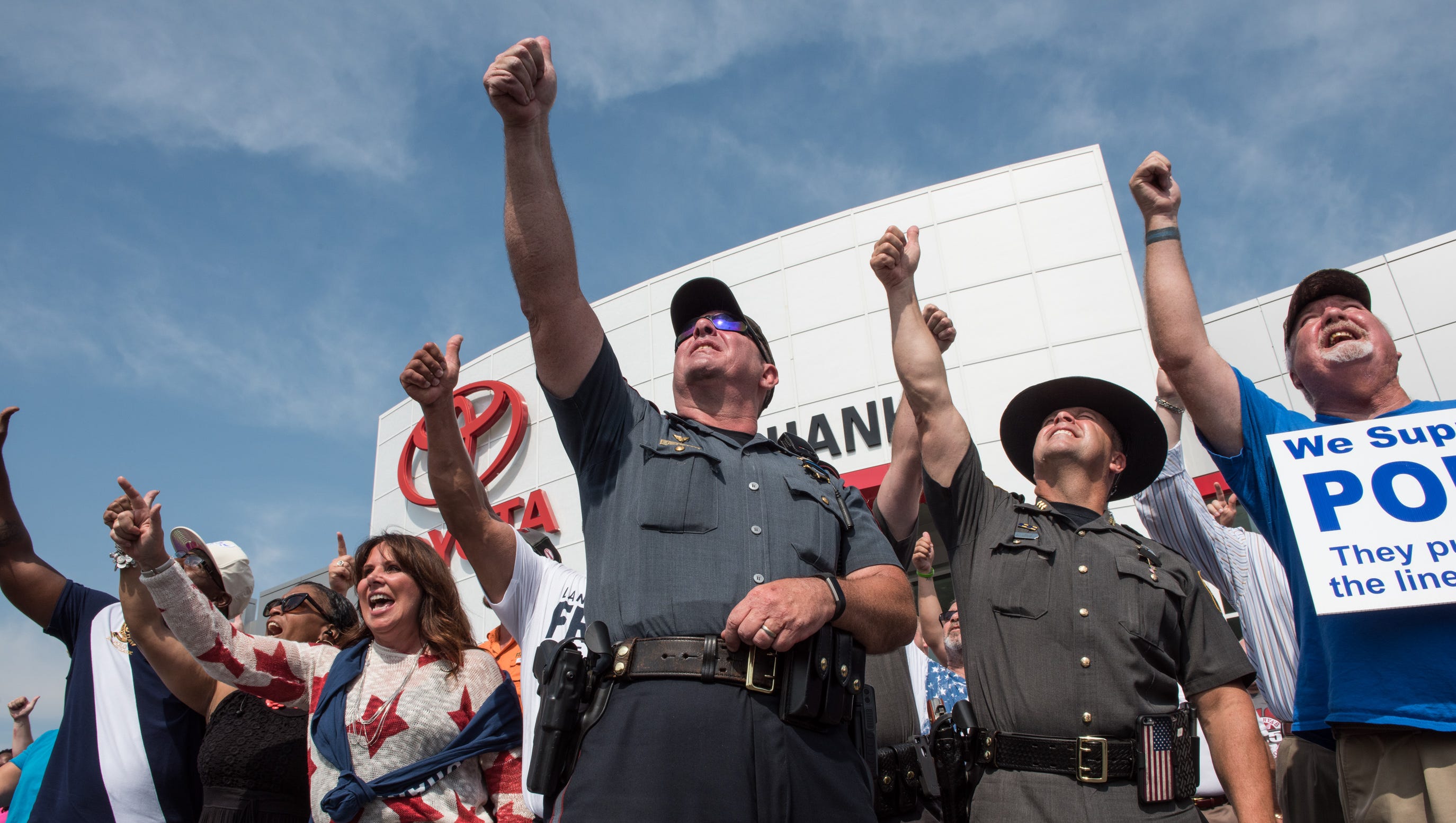 Rally calls for police, community to join amid violence