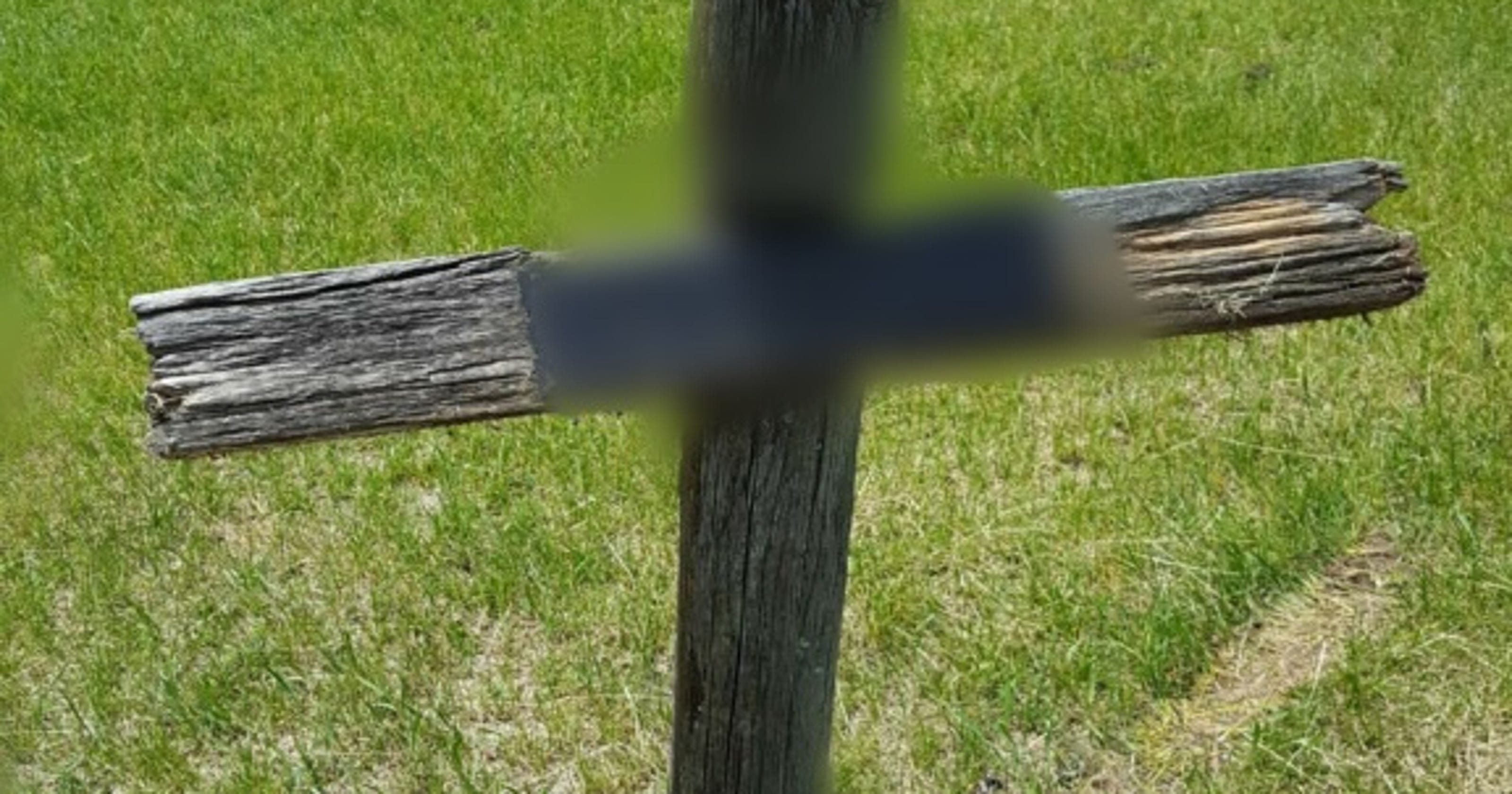 The wooden cross Mukwonago couple replaces old grave marker