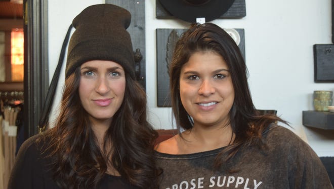 Linsay Blaze, left, and Kellen Nascimento stand in their new shop All Things Co. at The Factory in Franklin on Nov. 15, 2016. The two started the new shop earlier this year.