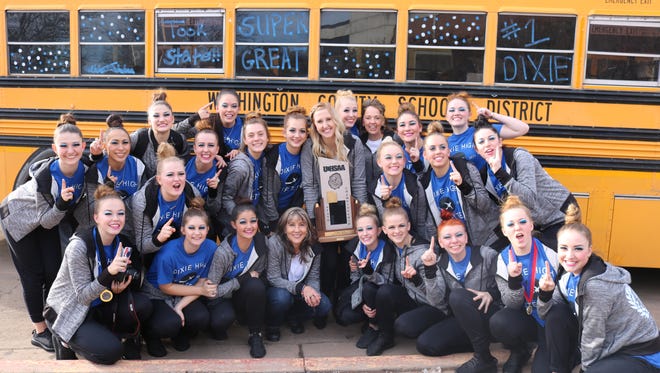 Dixie High's drill team poses with the state championship trophy after the Jetettes won their second straight 3A title Saturday, Feb. 4, 2017.