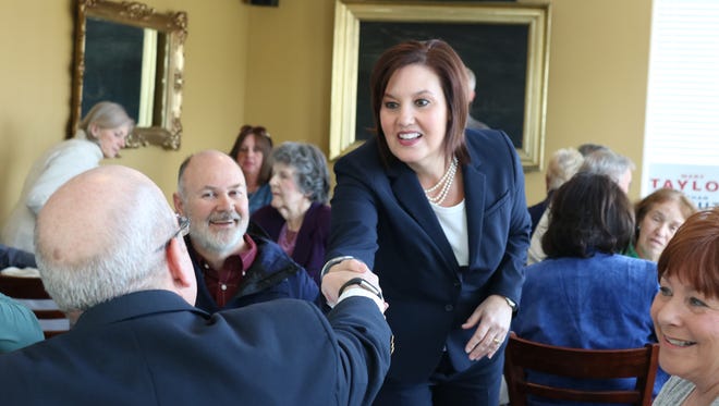 Ohio gubernatorial candidate Mary Taylor greets locals during campaign stop in Port Clinton on Monday.