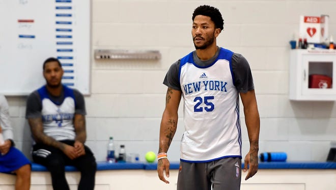 New York Knicks guard Derrick Rose attends practice as Carmelo Antony looks on in the MSG Training Center on Tuesday, January 10, 2017. Rose disappeared without notifying his coach or team before last night's game against the New Orleans Pelicans. 