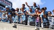 Fans cheer as players come out for the Manchester City-Tottenham