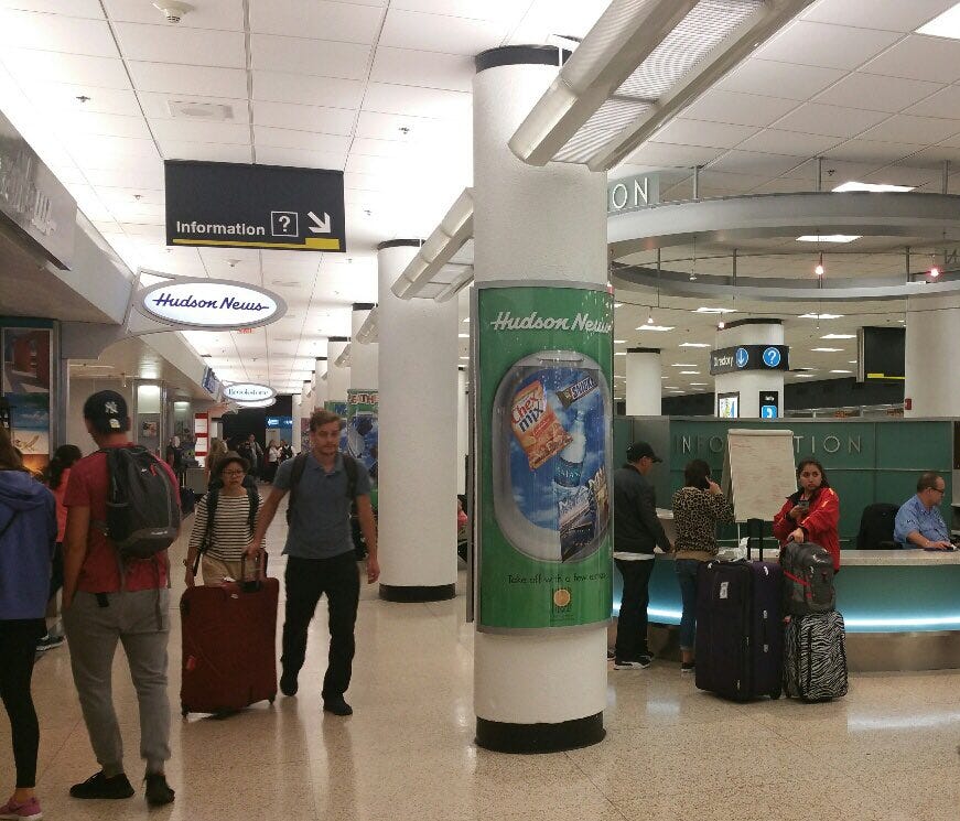 This photo, provided by Miami International Airport, shows passengers moving through the terminals as flights resumed there after Hurricane Irma.