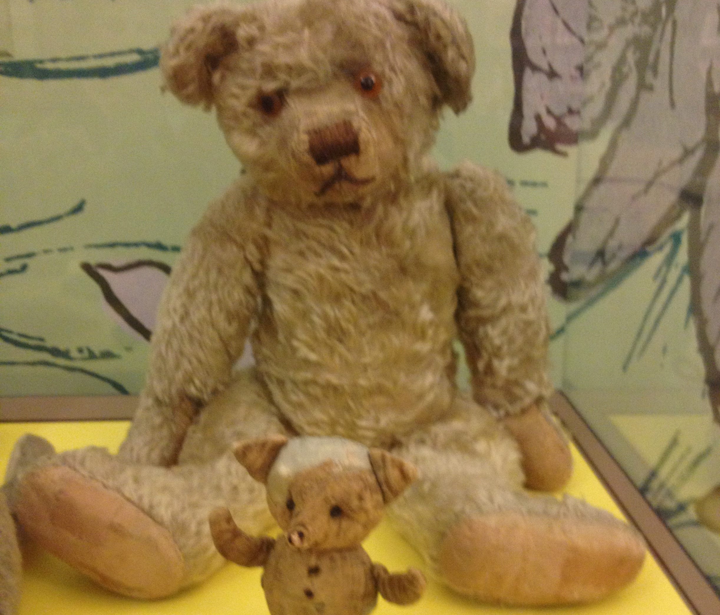 The real, much-loved Winnie-the-Pooh, with his tiny pal, Piglet.