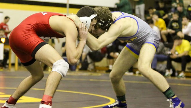 Delsea's Lorenzo Ruggiero, left ,grapples with Mason Brestle of Buena in the 152-pound finals in December's Robin Leff Classic at Southern. Brestle won the matchup by a point and could face Ruggiero in Saturday's District 31  final at Delsea.