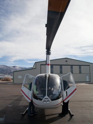 A student and instructor get out of one the helicopters at Upper Limit Aviation . The Cedar City Council heard complaints Wednesday from residents who live northwest of the 6800 block of Lund Highway near Three Peaks about helicopter noise.