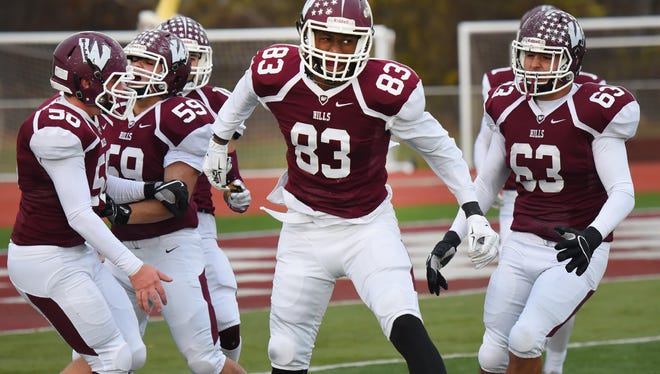Evidence Njoku (83) reacting after scoring a touchdown for Wayne Hills against Roxbury.