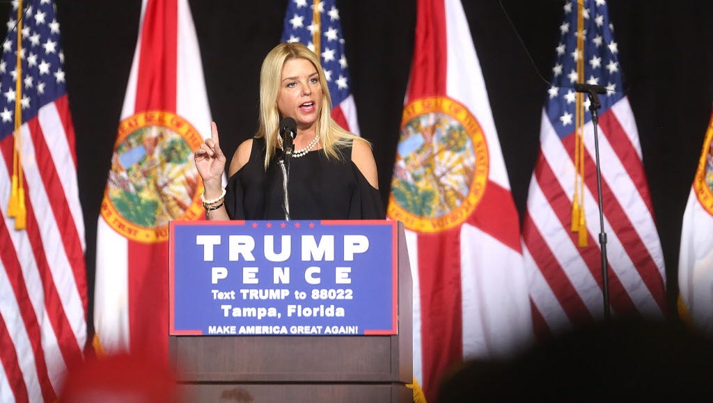 Florida Attorney General Pam Bondi speaks to Donald Trump supporters during a campaign rally in Tampa Aug. 24, 2016.