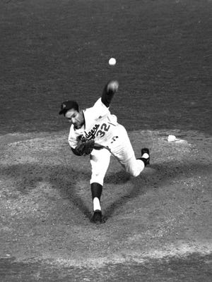 Sandy Koufax fires a pitch during his perfect game against the Cubs in 1965.
