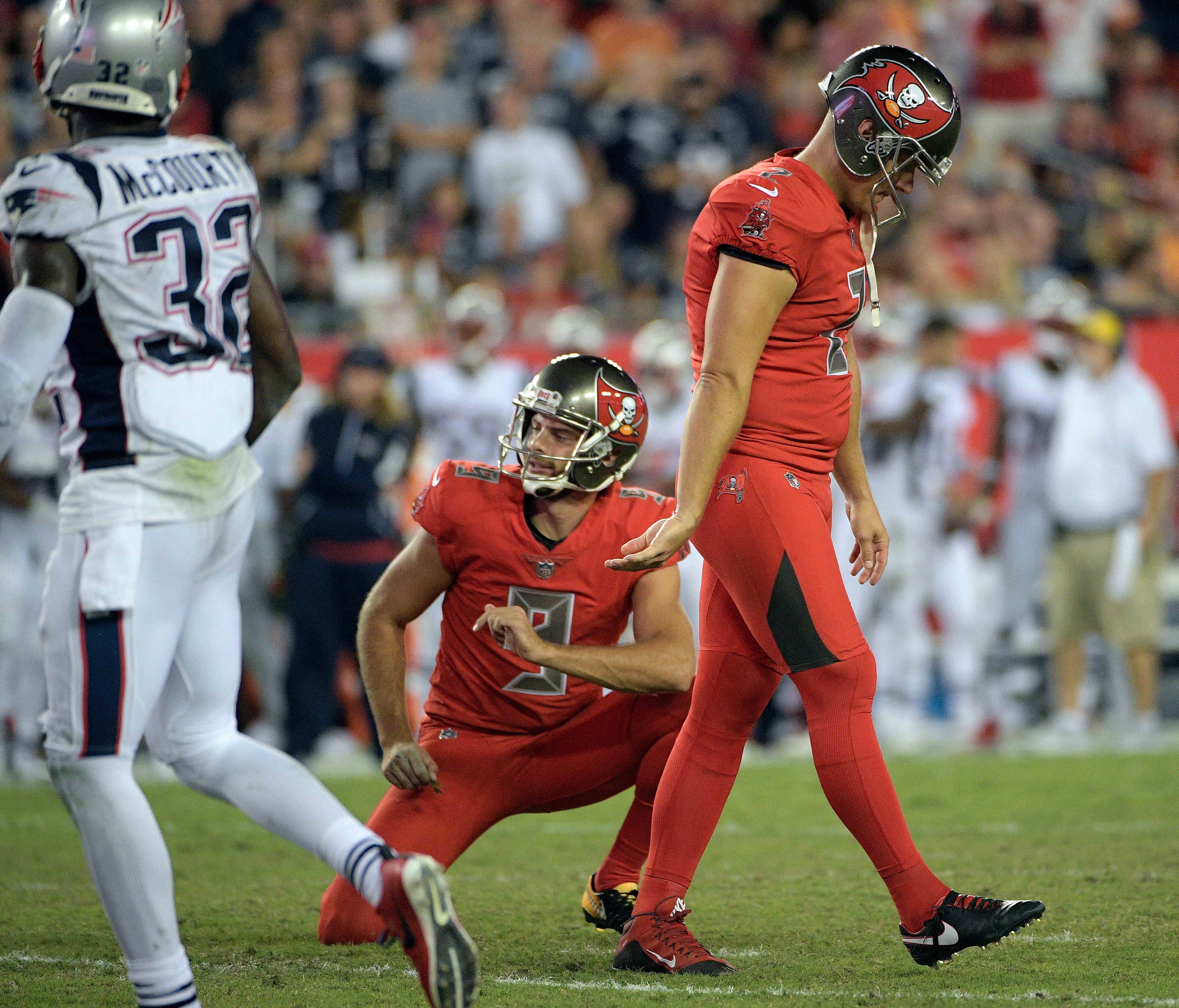 Tampa Bay Buccaneers kicker Nick Folk (2) reacts after missing a field goal against the New England Patriots during the fourth quarter of an NFL football game against the New England Patriots Thursday, Oct. 5, 2017, in Tampa, Fla. Holding for the Buc