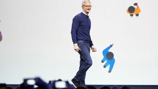 Apple began 2019 warning investors of weaker demand for the iPhone XS and XR phones in China, but 2019 finished as a record year for the company and CEO Tim Cook, pictured here.