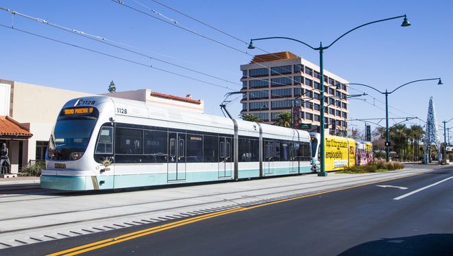 Downtown Mesa, with the Mesa Arts Center and shops along Main Street and Center, is where officials want to create an innovation district. The light rail runs down Main Street on Jan. 17, 2018.