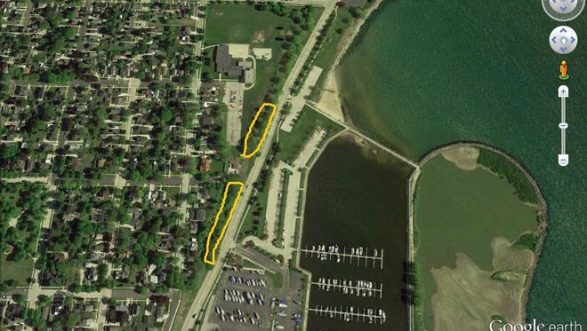 Woodland Dunes has developed a management plan for the hillside portions, marked here in yellow, along Maritime Drive that would replace existing trees with other species that would benefit birds while not growing so large.