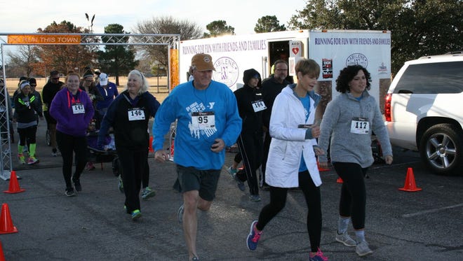 More than 100 runners and walkers participated in the YMCA's sixth annual Resolution Run on Saturday at Redbud Park.