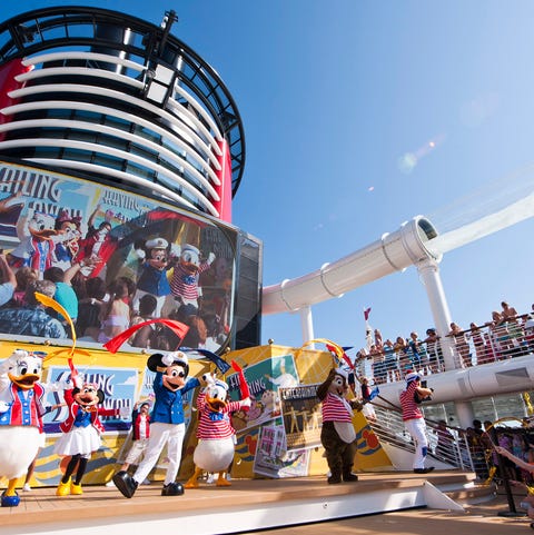 Guests are welcomed aboard the Disney Dream with "