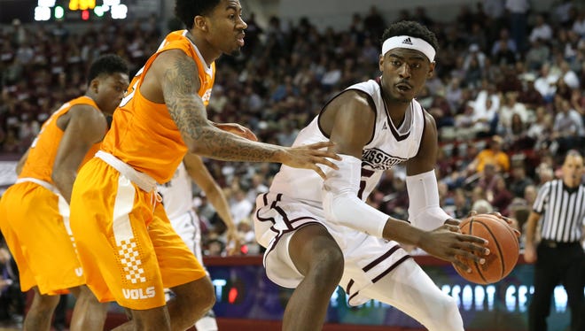 Aric Holman looks to make a pass during MSU's game against Tennessee.