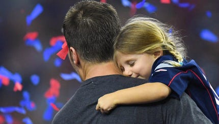 New England Patriots quarterback Tom Brady  and...