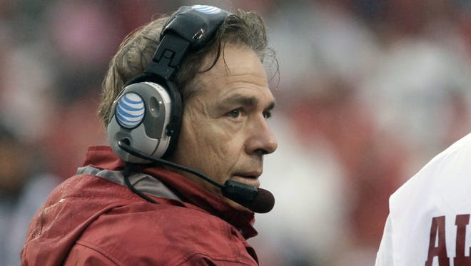 Alabama coach Nick Saban watches the first half of an NCAA college football game against Arkansas in Fayetteville, Ark., Saturday, Oct. 11, 2014. (AP Photo/Danny Johnston)
