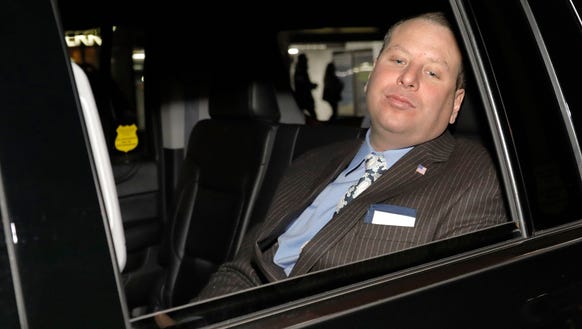 Former Trump campaign aide Sam Nunberg leaves in a