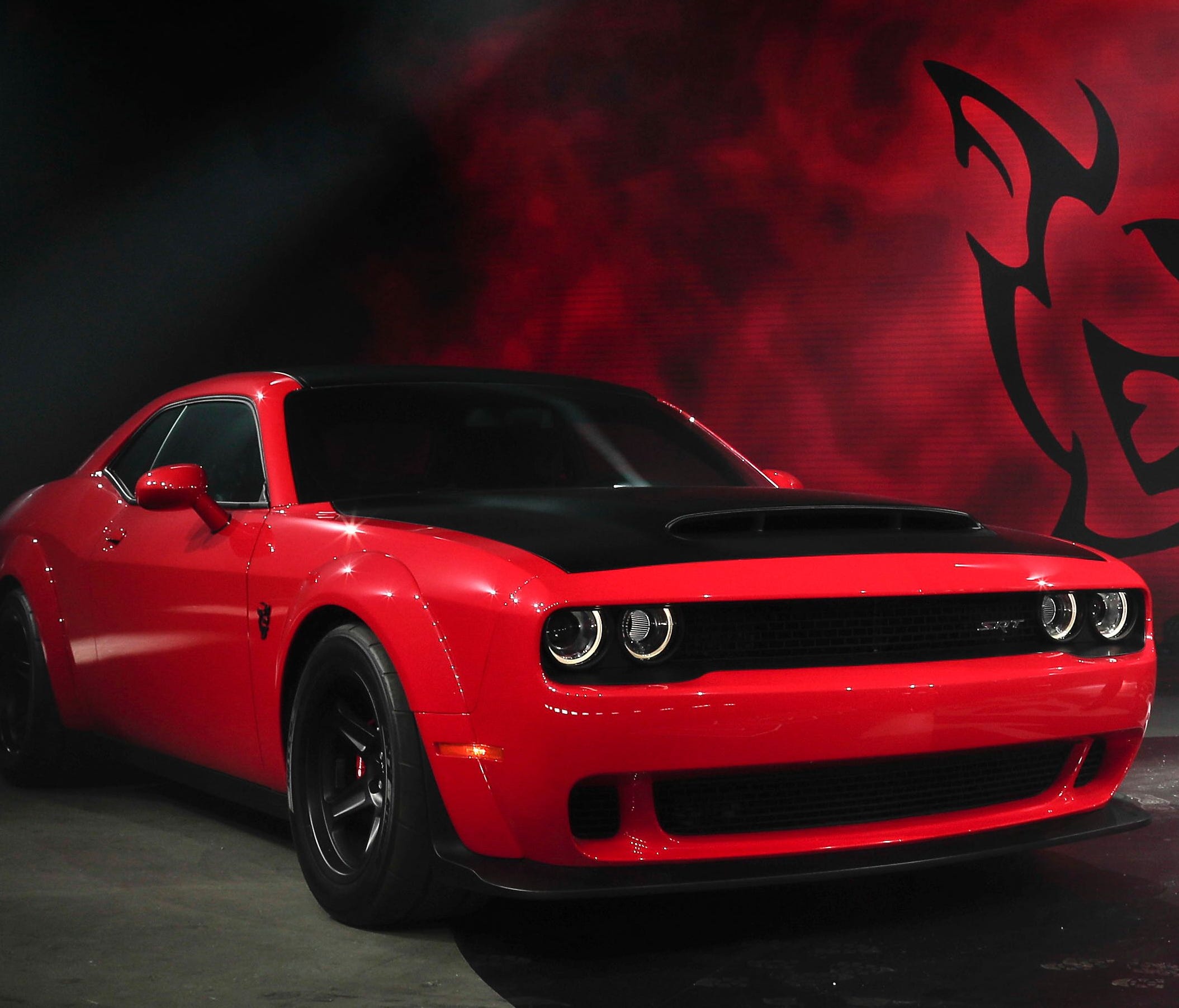 The 2018 Dodge Challenger SRT Demon during a media preview for the New York International Auto Show in New York. This limited-edition variant boasts a maximum 840 horsepower and various modifications to improve straight-line acceleration.