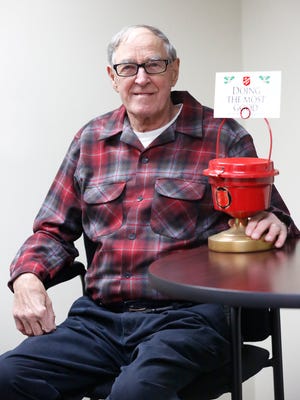 John Pelletier poses with a Salvation Army kettle Nov. 23, 2016.