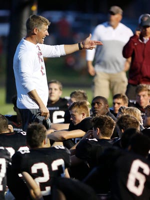 Fond du Lac High School football's head coach Mike Gnewuch talks to his team during half-time during the game against Kimberly High School on Friday, Aug.18, 2017, at Fruth Field in Fond du Lac. Kimberly won the matchup 35-28. Doug Raflik/USA TODAY NETWORK-Wisconsin