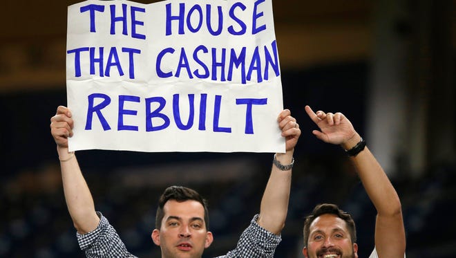 New York Yankees fans hold up a sign supporting Yankees General Manager Brian Cashman's selloff of some of his players, at the conclusion of a baseball game between the Yankees and the New York Mets, Thursday, Aug. 4, 2016, in New York. The Mets defeated the Yankees 4-1.