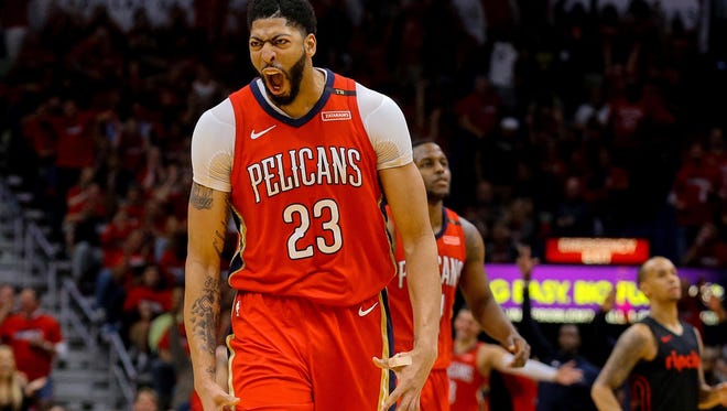 New Orleans Pelicans forward Anthony Davis (23) celebrates during the second half in game three of the first round of the 2018 NBA Playoffs against the Portland Trail Blazers at the Smoothie King Center.