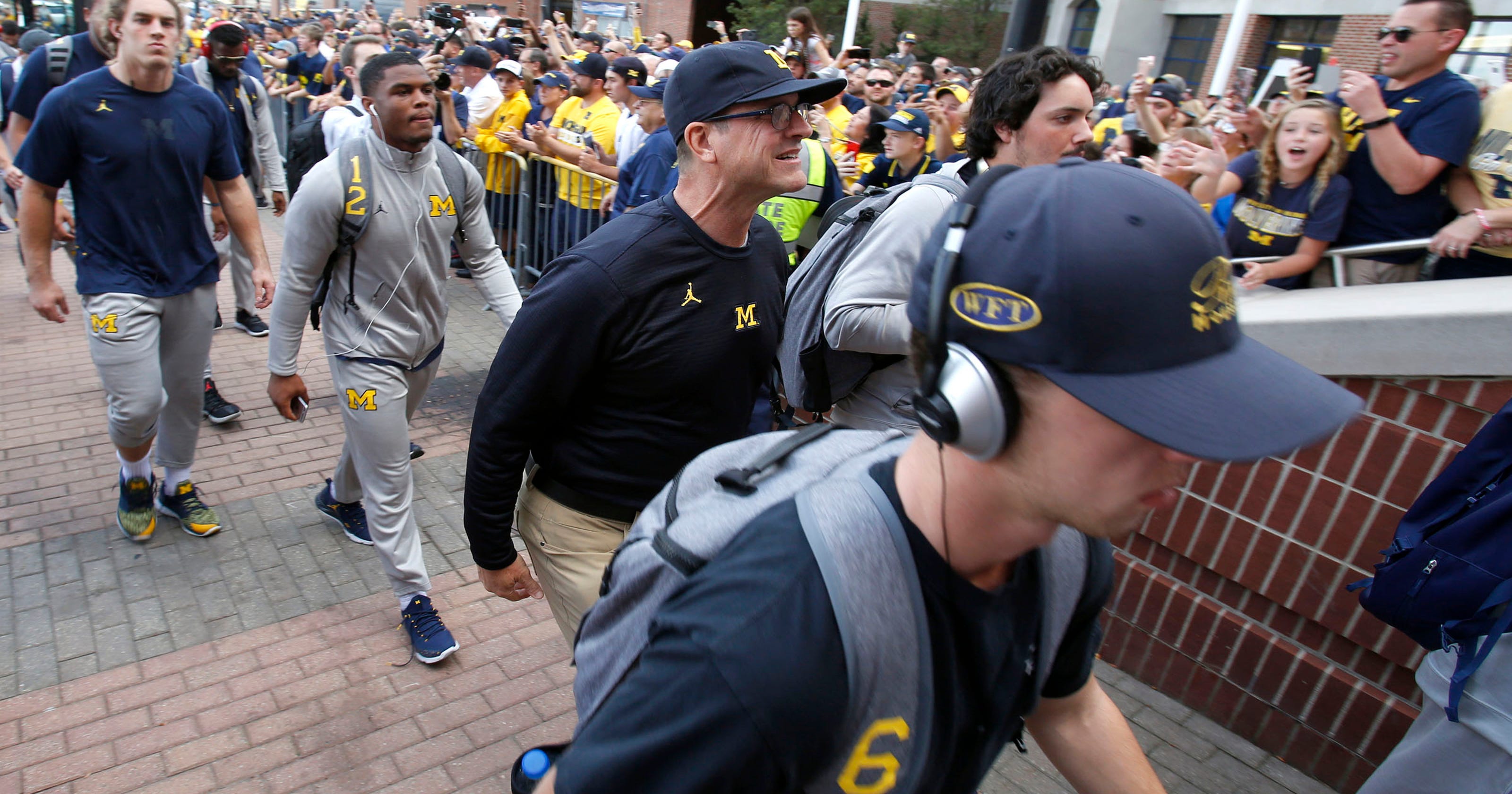 Michigan's Jim Harbaugh has same record through 31 games as Brady Hoke