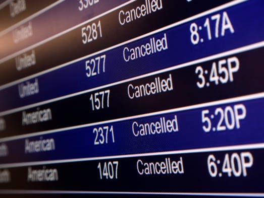 Flight cancellations top 13,400 as brutal travel week ends