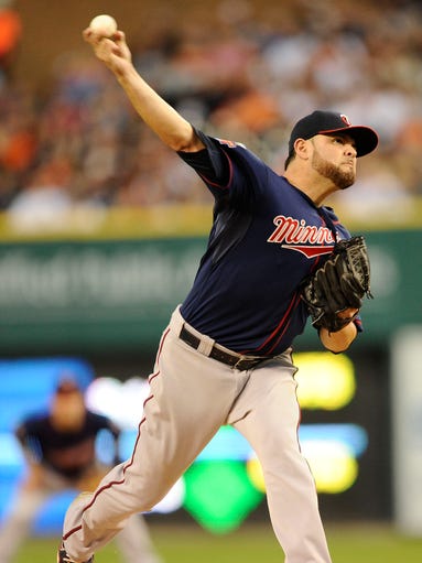 Twins starting pitcher Ricky Nolasco pitches in the first inning. Nolasco threw 91 pitches for 60 strikes to get the win for the Twins.
