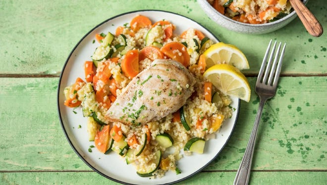 Mediterranean Skillet Chicken with Bulgar Paella, Carrots and Apricots