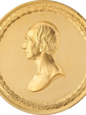 A gold medal that was presented in 1852 to Secretary of State Henry Clay from Kentucky sold for $346,000 at a Sept. 17 auction in Dallas.