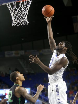 MTSU's Darnell Harris (0) hasn't been his typical self recently. Head coach Kermit Davis said the senior center had a great week of preparation ahead of the matchup with Michigan State.