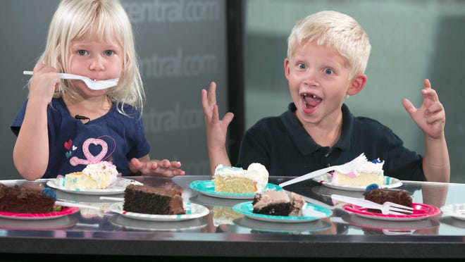 Charlotte Rough, 3, and brother, Scott Rough, 6, enjoy the test. Charlotte Rough, 3, and her brother, Scott Rough, 6, taste test sheet cake in the azcentral studio in Phoenix on September 7, 2016. Credit: David Wallace/The Republic