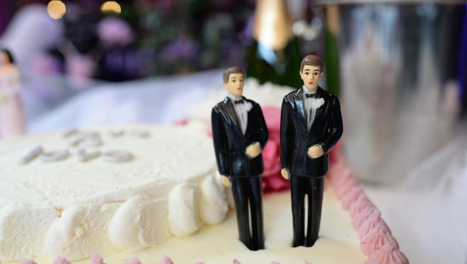 A wedding cake with a male couple is seen last year at The Abbey restaurant in West Hollywood, California. On Wednesday, Oct. 7, 2014, the Ninth Circuit Court of Appeals struck down same-sex marriage bans in Nevada and Idaho.