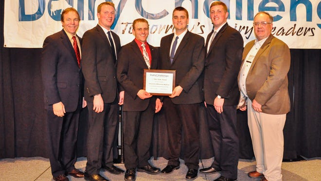 UW–Madison's team won the 2018 North American Intercollegiate Dairy Challenge. The experience of participating in the challenge--and preparing for it--helped the team members prepare for jobs that involve troubleshooting dairy operations. Pictured from left, Ted Halbach, coach, Logan Voigts, Charles Hamilton, Connor Willems, Anthony Schmitz, and David Combs, coach